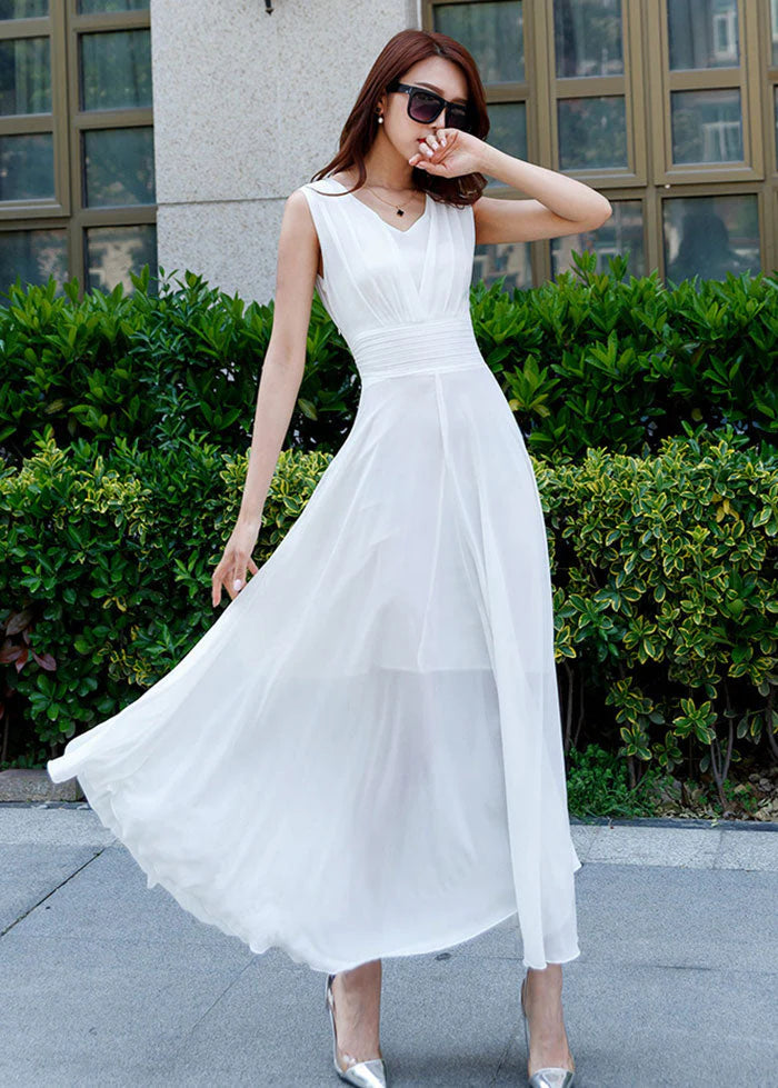 Robe maxi en mousseline blanche sans manches à taille haute