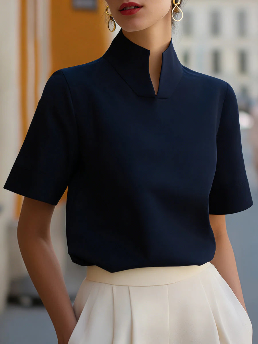 Blouse structurée minimaliste pour femmes à col montant