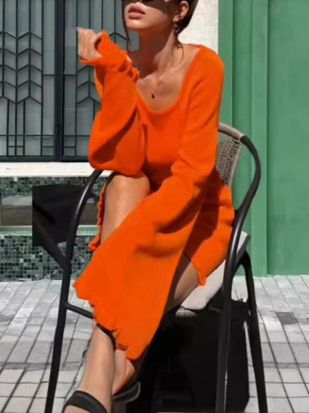 Robe pull en maille à manches longues et dos nu