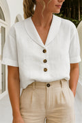 Blouse femme manches courtes avec col foulard et détails à boutons