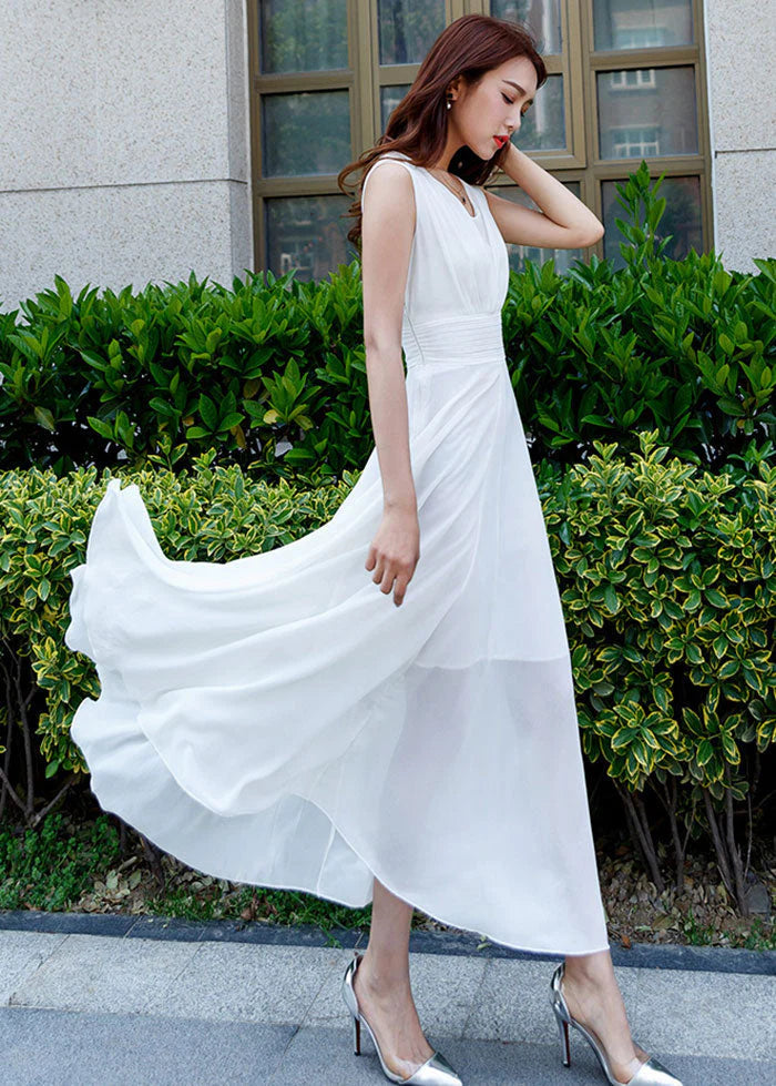 Robe maxi en mousseline blanche sans manches à taille haute