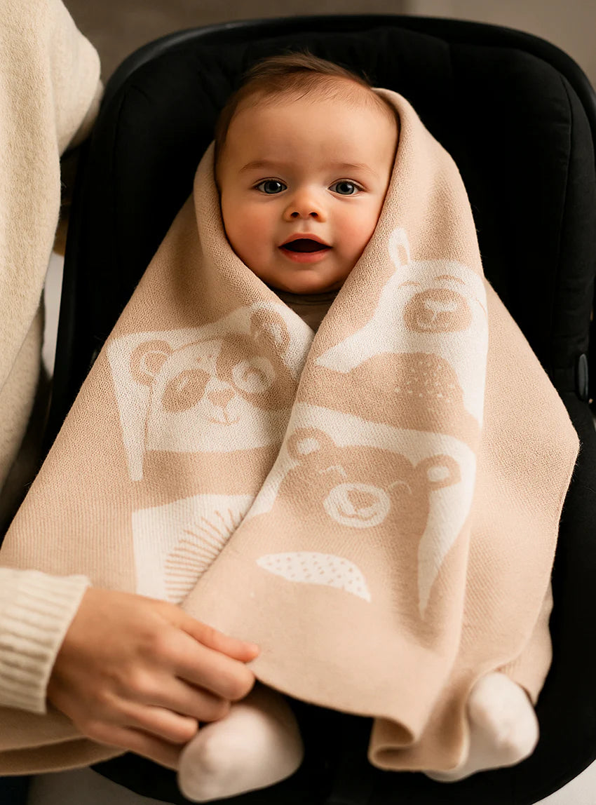 Couverture bébé  laine mérinos motif animaux beige pastel