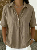Blouse avec col et détail de bouton