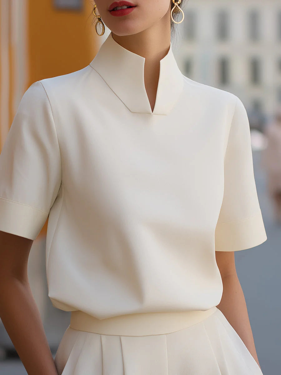 Blouse structurée minimaliste pour femmes à col montant