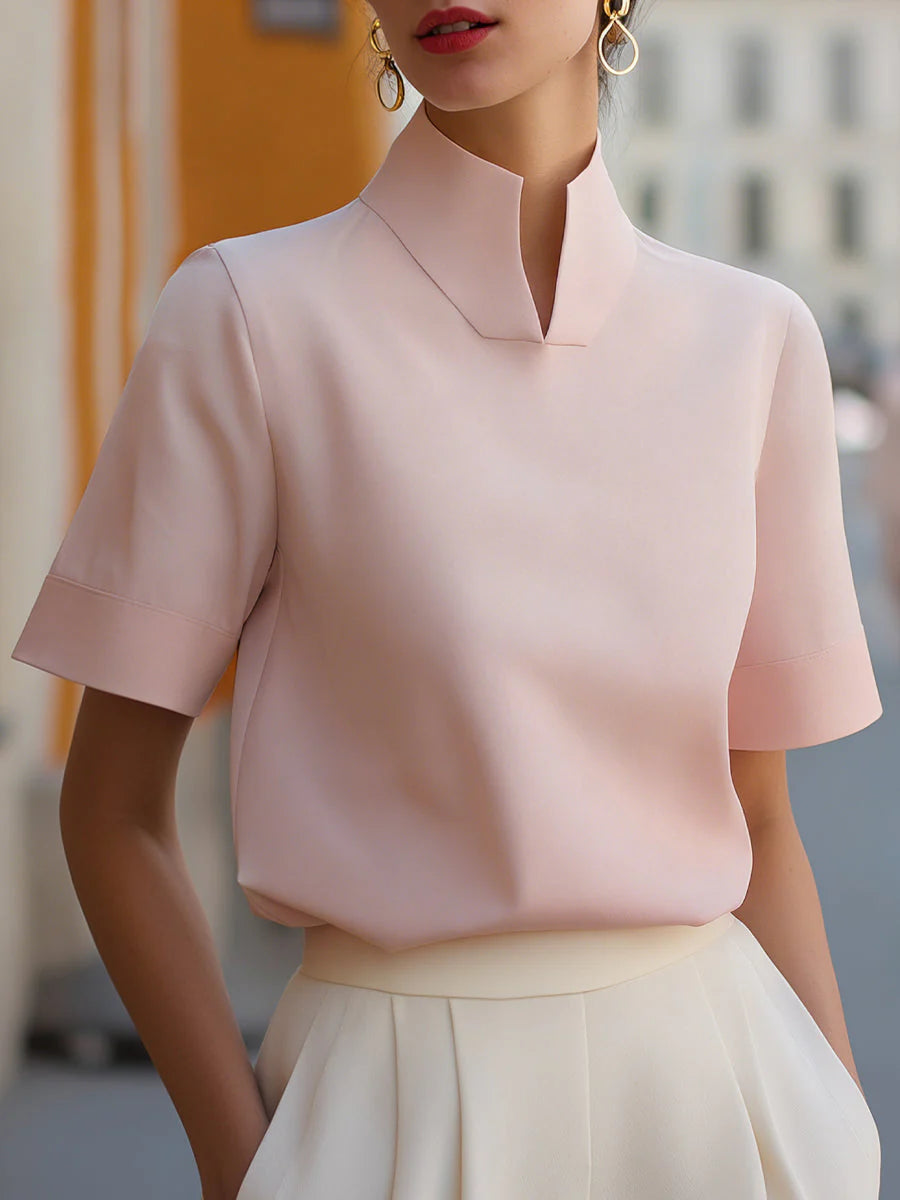 Blouse structurée minimaliste pour femmes à col montant
