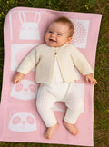 Plaid bébé laine mérinos motif animaux rose poudre