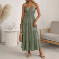 Robe longue dos nu à col halter avec drapés fluides