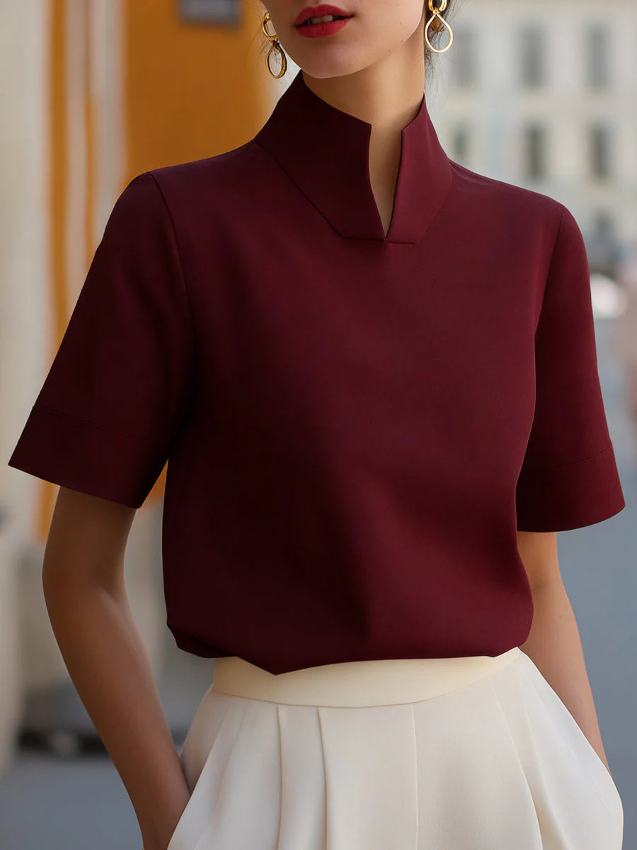 Blouse structurée minimaliste pour femmes à col montant