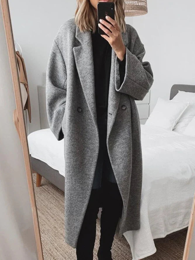 Manteau long élégant à double bouton et coupe ample